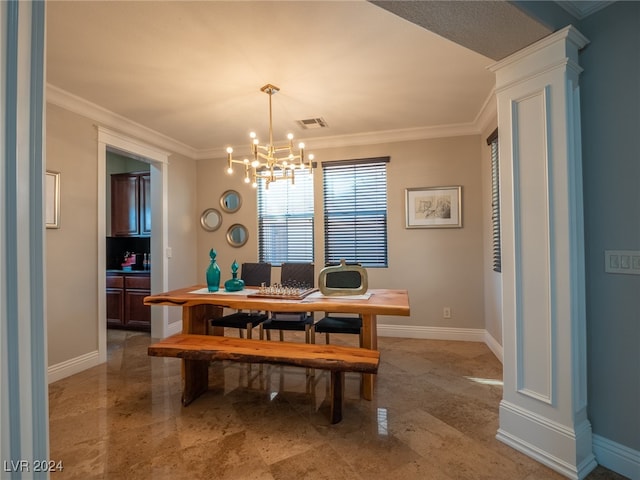 dining room with an inviting chandelier and ornamental molding