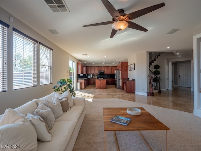 living room with ceiling fan