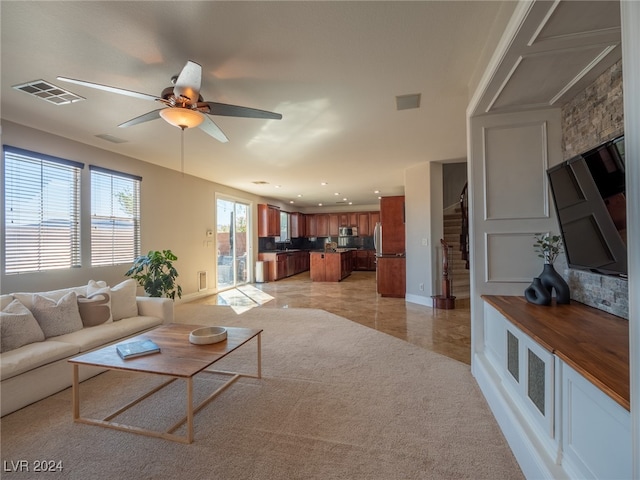 living room with ceiling fan