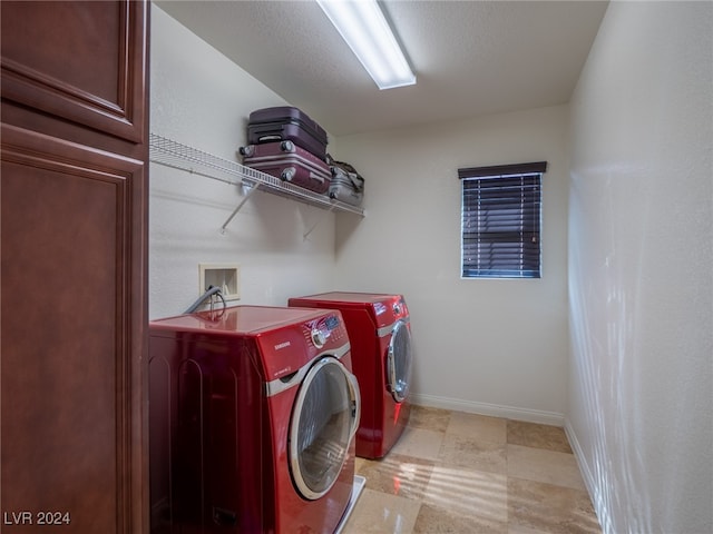 washroom featuring independent washer and dryer