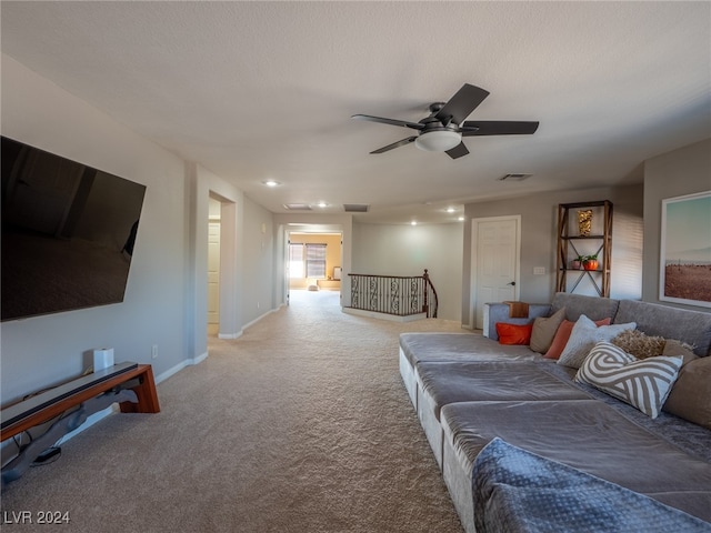 living room with carpet and ceiling fan