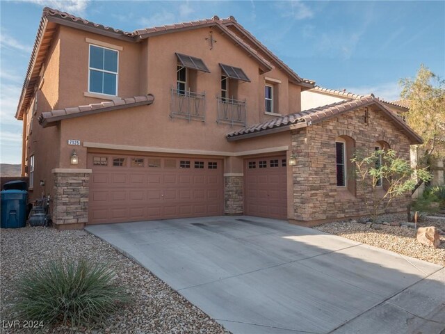 view of front of property with a garage