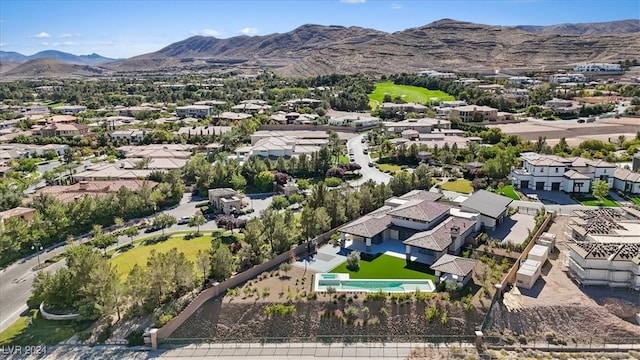 drone / aerial view featuring a mountain view