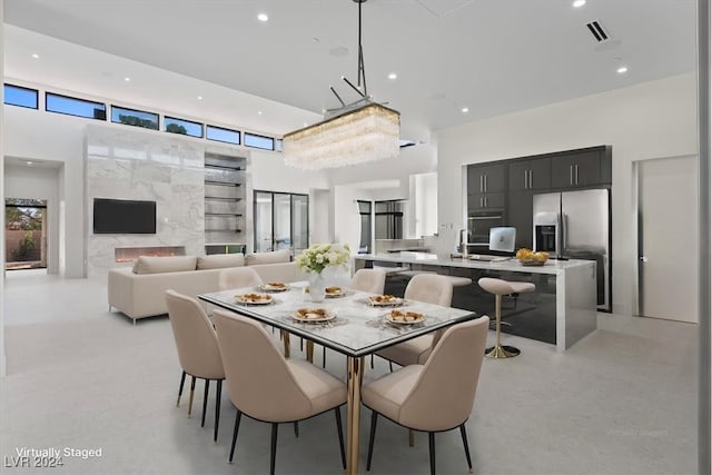 dining area with built in shelves and sink