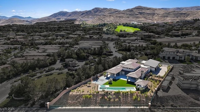 drone / aerial view featuring a mountain view