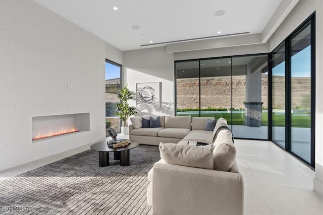 1 Olympia Canyon Way, Las Vegas, NV 89141 - living room with a glass covered fireplace and recessed lighting