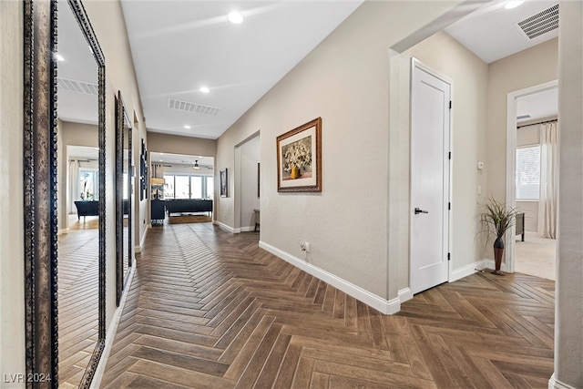 hall featuring dark parquet floors