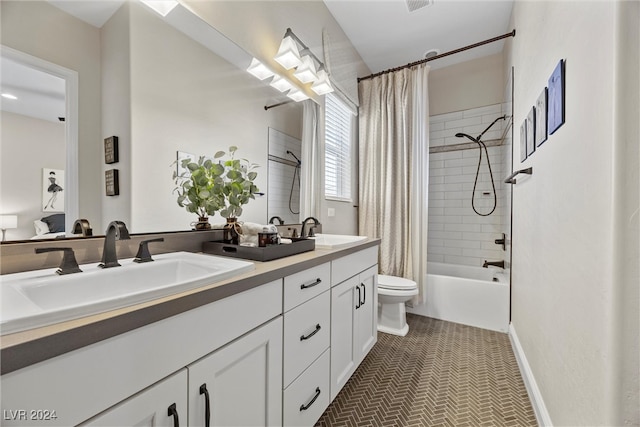 full bathroom featuring tile patterned flooring, vanity, shower / tub combo, and toilet