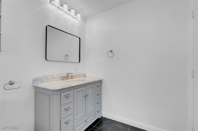 bathroom with vanity and tile patterned floors