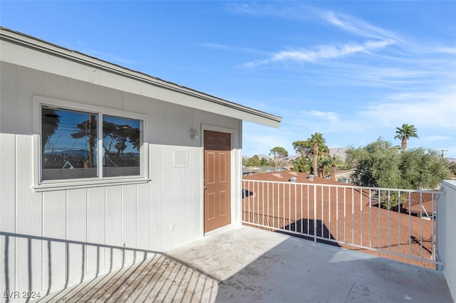 doorway to property featuring a balcony