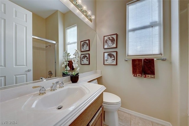 full bath with baseboards, toilet, tile patterned flooring, an enclosed shower, and vanity