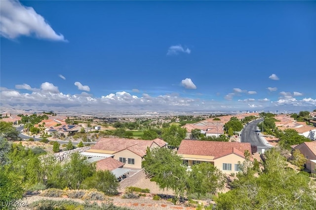 birds eye view of property with a residential view