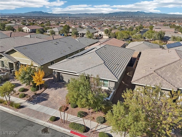 drone / aerial view featuring a mountain view