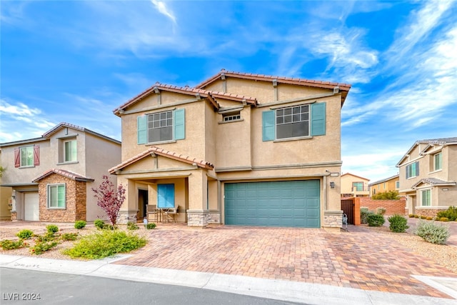 view of front of property with a garage