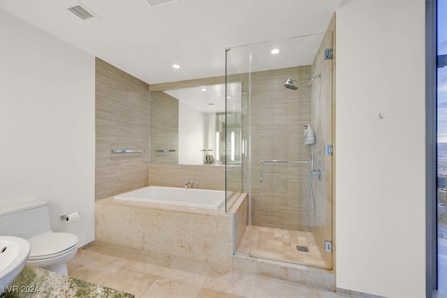 full bathroom with tile patterned flooring, sink, toilet, and independent shower and bath