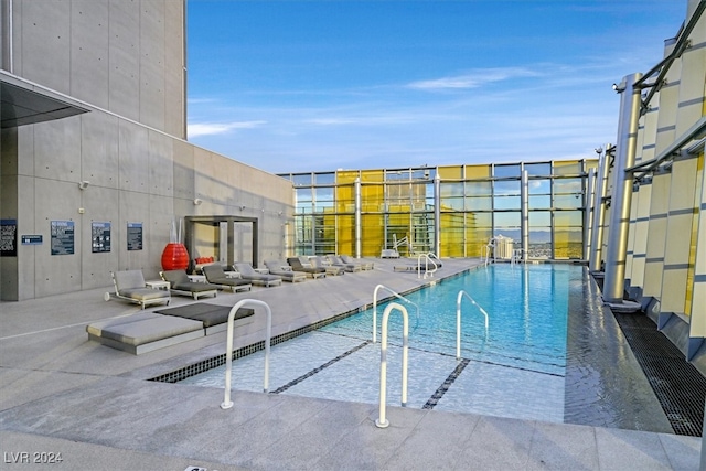 view of pool featuring a patio