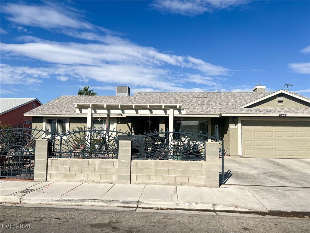 view of front of property with a garage