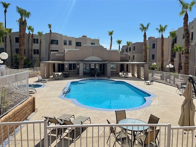 view of pool featuring a patio area