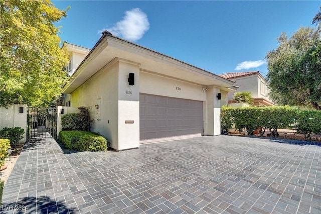 view of property exterior with a garage