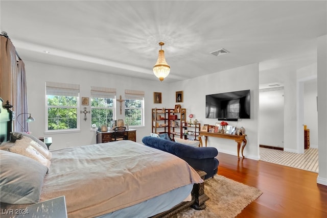 bedroom featuring hardwood / wood-style flooring