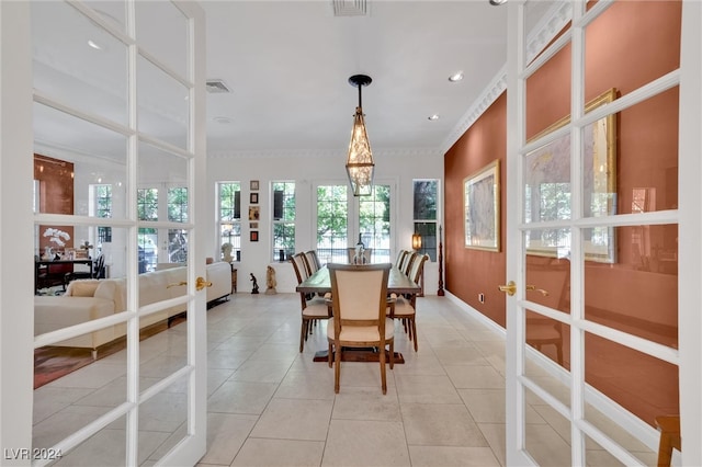 tiled dining space with french doors