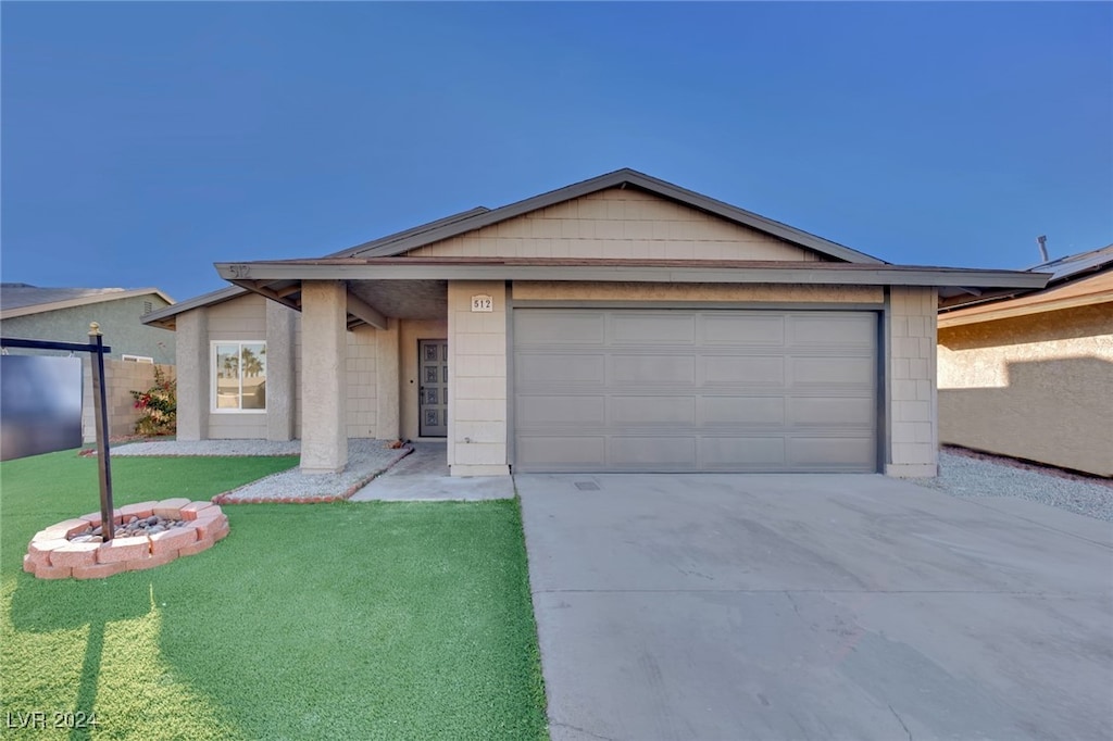 ranch-style home with a garage and a front lawn