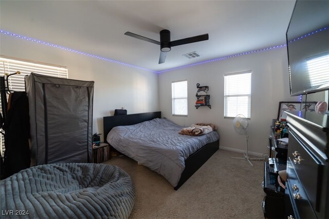 bedroom with carpet and ceiling fan