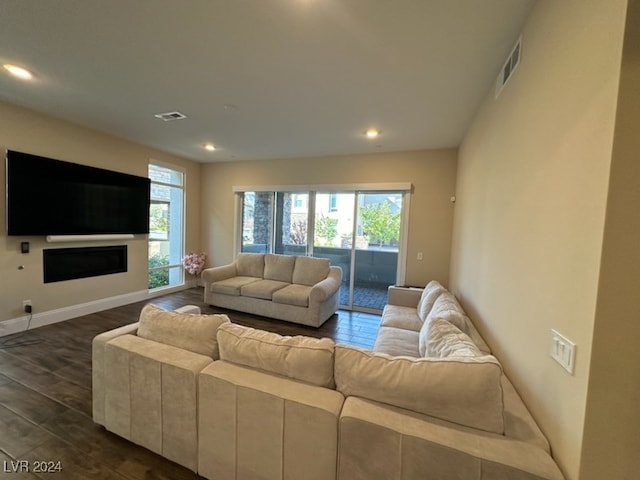 living room with dark wood-type flooring