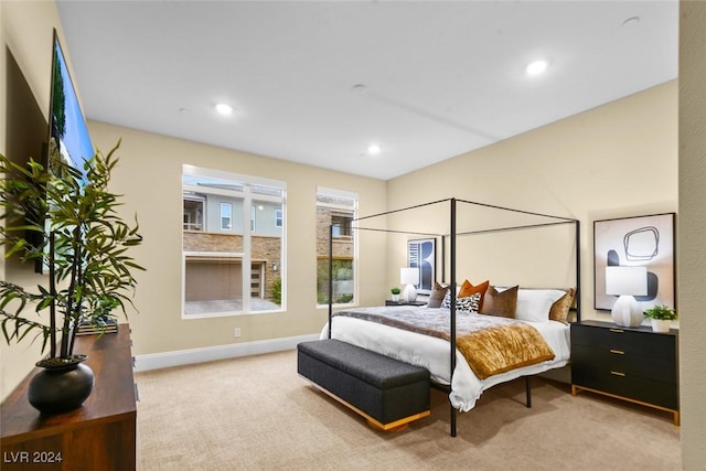 bedroom featuring baseboards, carpet, and recessed lighting