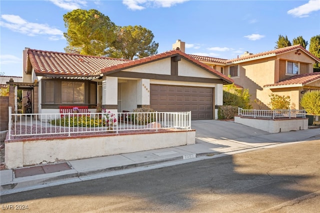 view of front of property featuring a garage