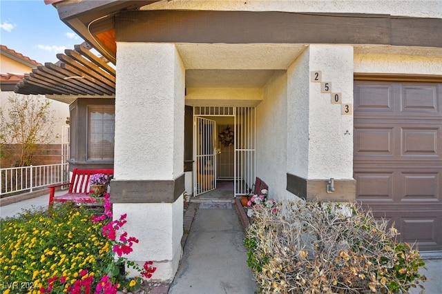 property entrance featuring a garage