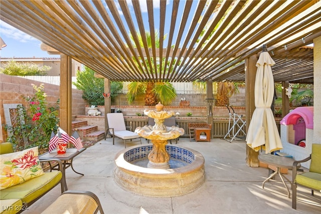 view of patio / terrace featuring a pergola