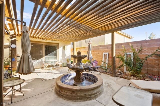 view of patio featuring a pergola