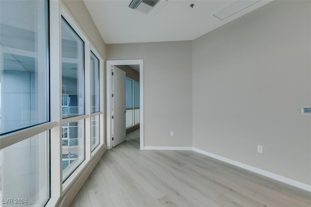 4525 Dean Martin Dr Unit 2704, Las Vegas, NV 89103 - unfurnished room with light wood-style flooring and baseboards