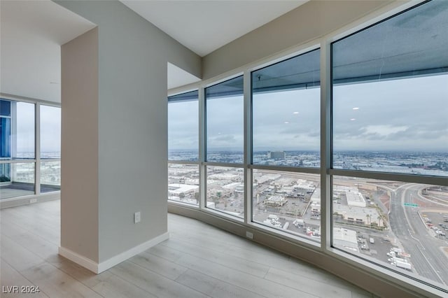 4525 Dean Martin Dr Unit 2704, Las Vegas, NV 89103 - empty room featuring wood finished floors and baseboards