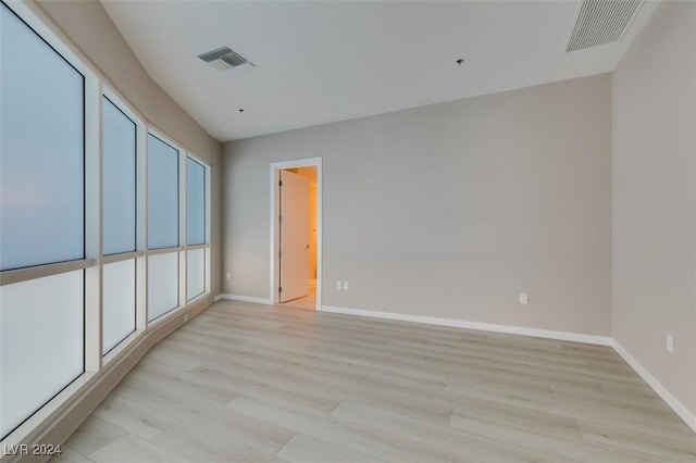 4525 Dean Martin Dr Unit 2704, Las Vegas, NV 89103 - unfurnished bedroom featuring light wood-style flooring and baseboards