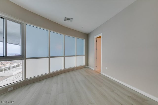 4525 Dean Martin Dr Unit 2704, Las Vegas, NV 89103 - empty room with light wood-style floors and baseboards