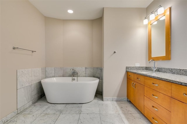 4525 Dean Martin Dr Unit 2704, Las Vegas, NV 89103 - bathroom featuring vanity, marble finish floors, and a soaking tub
