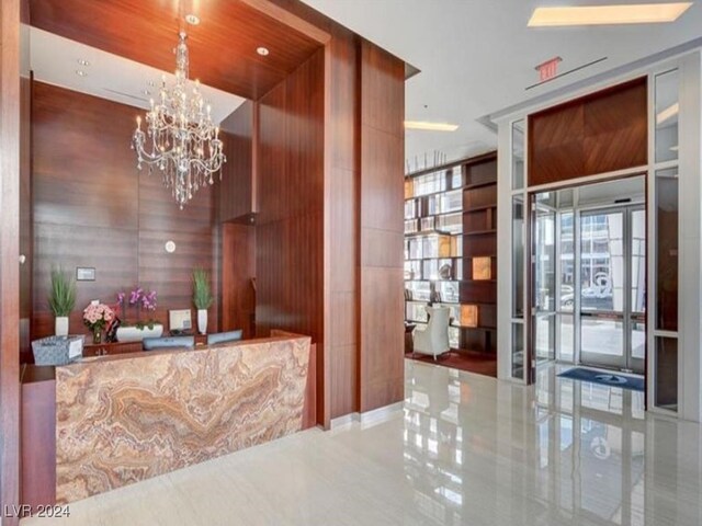 4525 Dean Martin Dr Unit 2704, Las Vegas, NV 89103 - reception featuring a chandelier