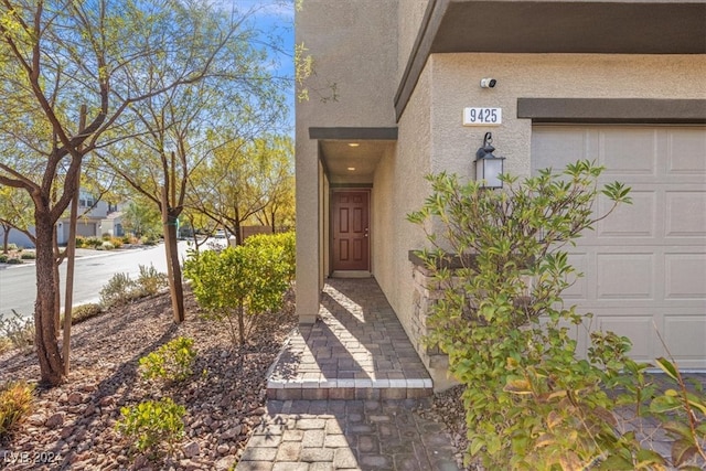 property entrance featuring a garage