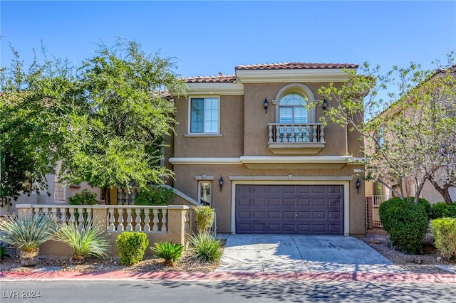 view of front of property featuring a garage