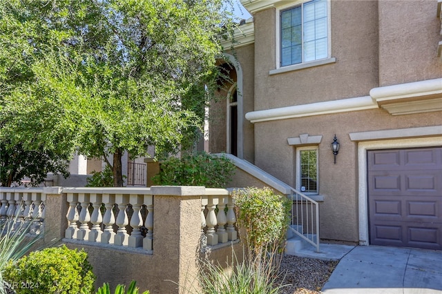 entrance to property with a garage