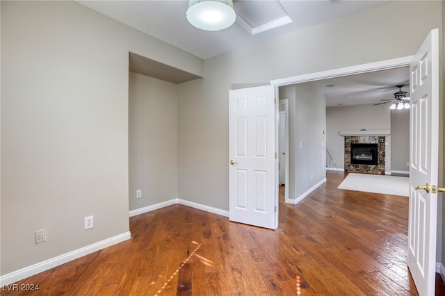 spare room featuring hardwood / wood-style flooring and ceiling fan