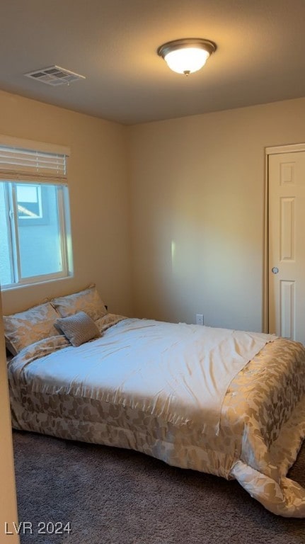 bedroom featuring carpet flooring