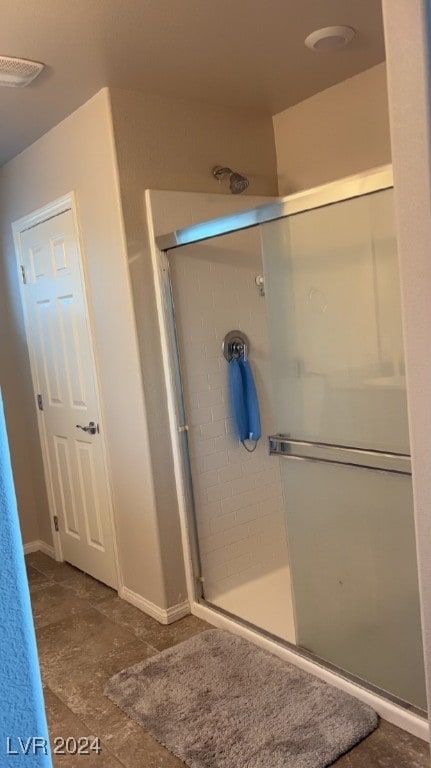 bathroom featuring walk in shower