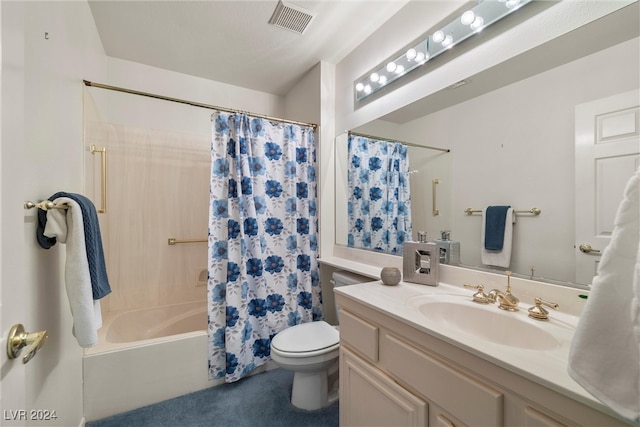 full bathroom with shower / tub combo with curtain, vanity, and toilet