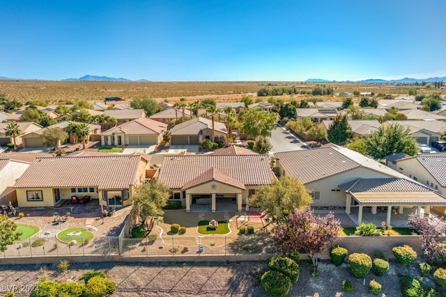 drone / aerial view featuring a mountain view