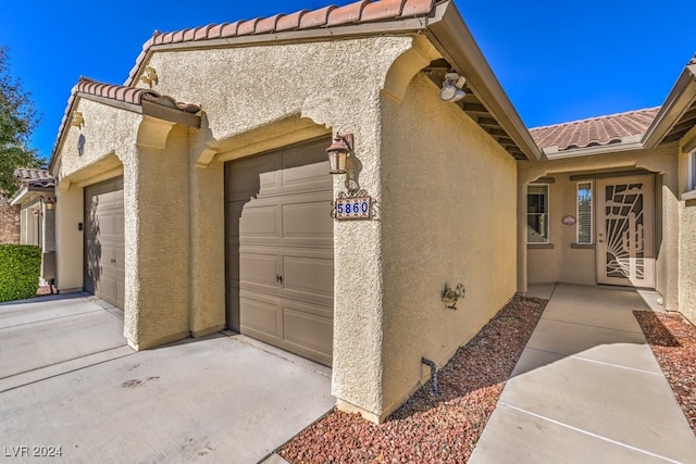 view of home's exterior with a garage