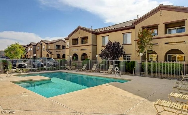 view of pool featuring a patio area