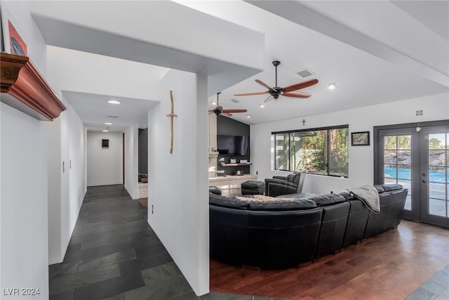 living room with ceiling fan and french doors